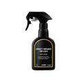 Honey I Washed The Kids body spray. A black spray bottle of Lush "Honey I Washed The Kids" Body Spray. The product label is black with a bright yellow banded border. White text states the product name and the scent description.