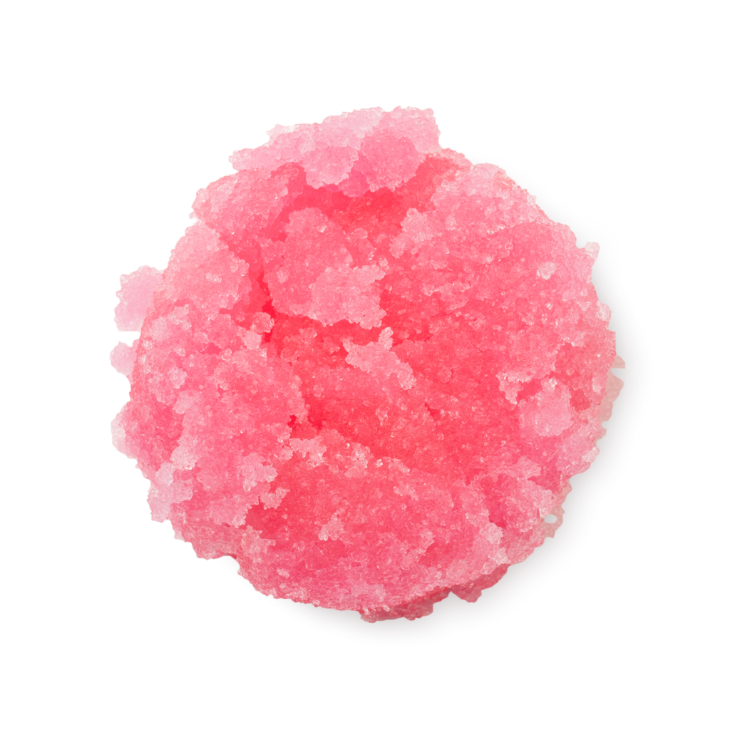 Bubblegum. A neatly piled swatch of thick, textured, vibrant pink lip scrub with visible sugar granules.