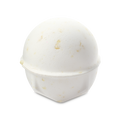 Butterball bath bomb. A smooth, ivory-white spherical bath bomb with a slightly textured surface. Small, buttery specks of cocoa butter are visible across the exterior. Standing alone against a plain light grey background.