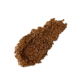Buzz. A neatly smeared swatch of thick, textured, deep caramel-coloured lip scrub with visible sugar granules.
