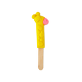 Elsie The Giraffe. A colourful, bright yellow bubble bar in the shape of a giraffe's neck and head. There are embossed spots and a pink mouth. The bubble bar is attached to the top of a wooden stick.