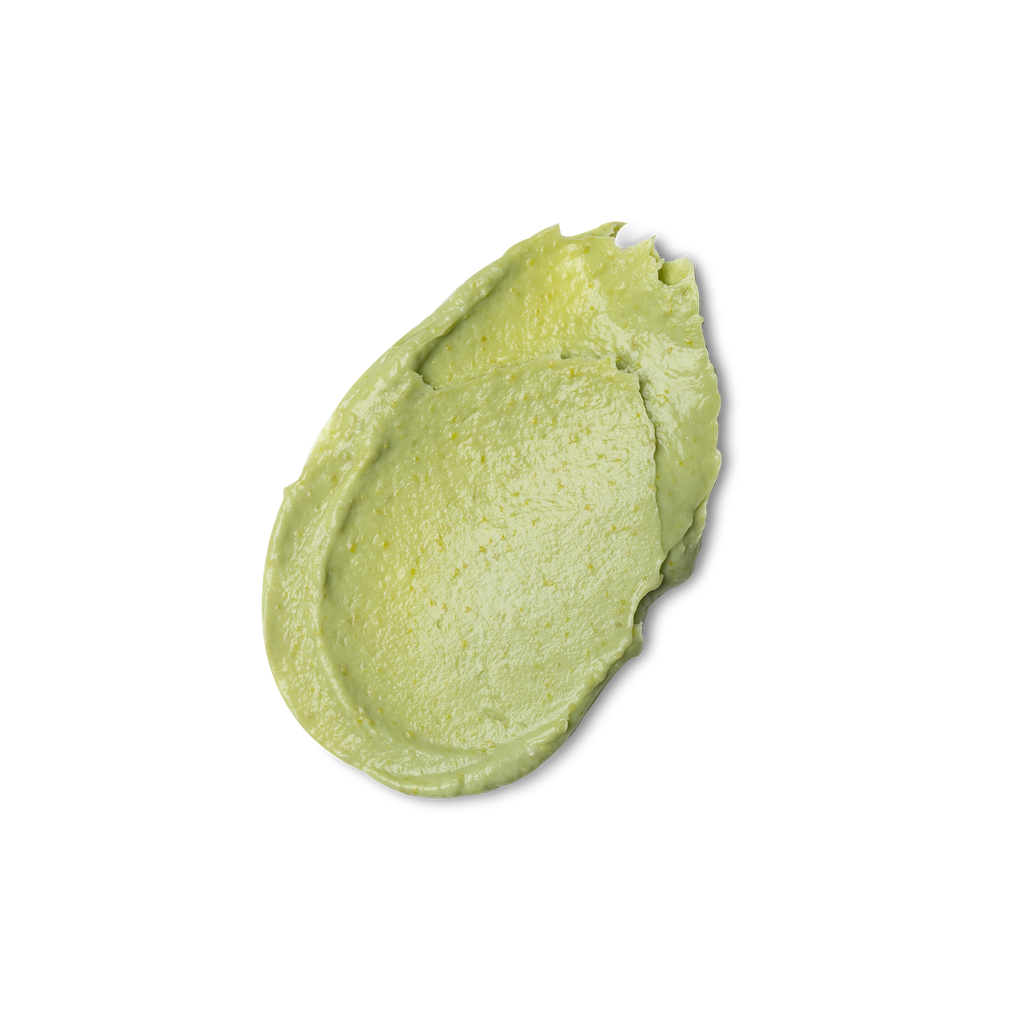 A swatch of thick, slightly textured, light green coloured Glory conditioner.