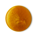 Golden Egg. A perfectly circular swatch of glossy, golden shower gel packed with glittery, gold lustre throughout.