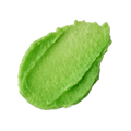 Key Lime Pie. A neatly smeared swatch of thick, lime-green coloured lip balm with a slightly glossy finish and tiny dark specks throughout.