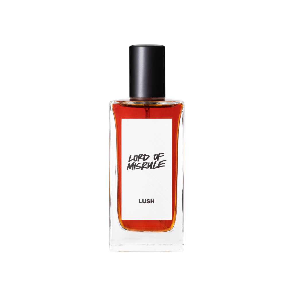 A glass perfume bottle filled with mahogany coloured liquid. A white label reads 'Lord Of Misrule'.