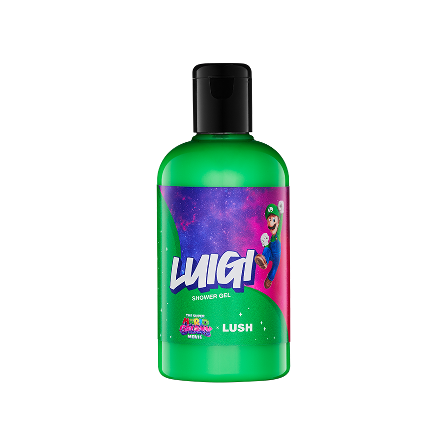 Green shower gel bottle with a black flip-top cap. The label features Luigi jumping against a purple, starry galaxy. "The Super Mario Galaxy Movie x LUSH" logos at the bottom of the label.