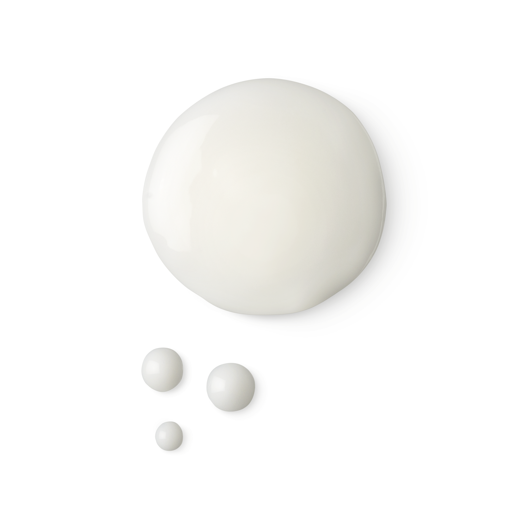 A sample, together with droplets, of smooth, light, white Super Milk conditioning spray.