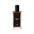 Sweet Pea. A rectangular, glass perfume bottle with a black cap is filled with translucent, dark-amber liquid. A black label reads 'Sweet Pea'.