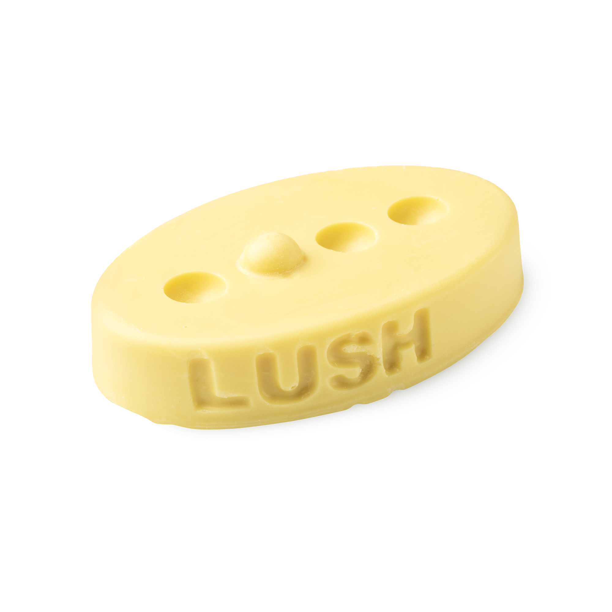 Therapy. A buttery yellow, oval shaped, solid massage bar, with a design of 3 small holes cut out with 1 bump in a line.