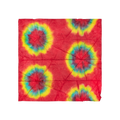 A square Lokta Wrap with red, green and yellow tie-dyed designs all over.