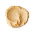 Tofu shampoo. A circular swatch of thick, creamy, pastel-yellow Tofu shampoo showing wispy peaks.
