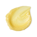 A swatch of thick, buttery yellow coloured Ultraplant cleansing balm.