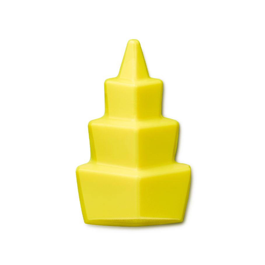 Uplifting. A bright yellow, smooth shower gummy is sculpted into a tiered, geometric tower shape. It features three stacked block sections that narrow towards a pointed, conical peak at the top.