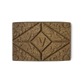 Vénitien Henna. A brown rectangular block of solid henna hair colour, with a floral design and the letter V pressed on the top.