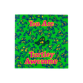 Turtley Awesome. A vibrant enamel pin in the shape of a green and yellow turtle is mounted on a matching, square green backing card with a repeating turtle pattern. Bold pink text on the card reads, 'You Are Turtley Awesome'.